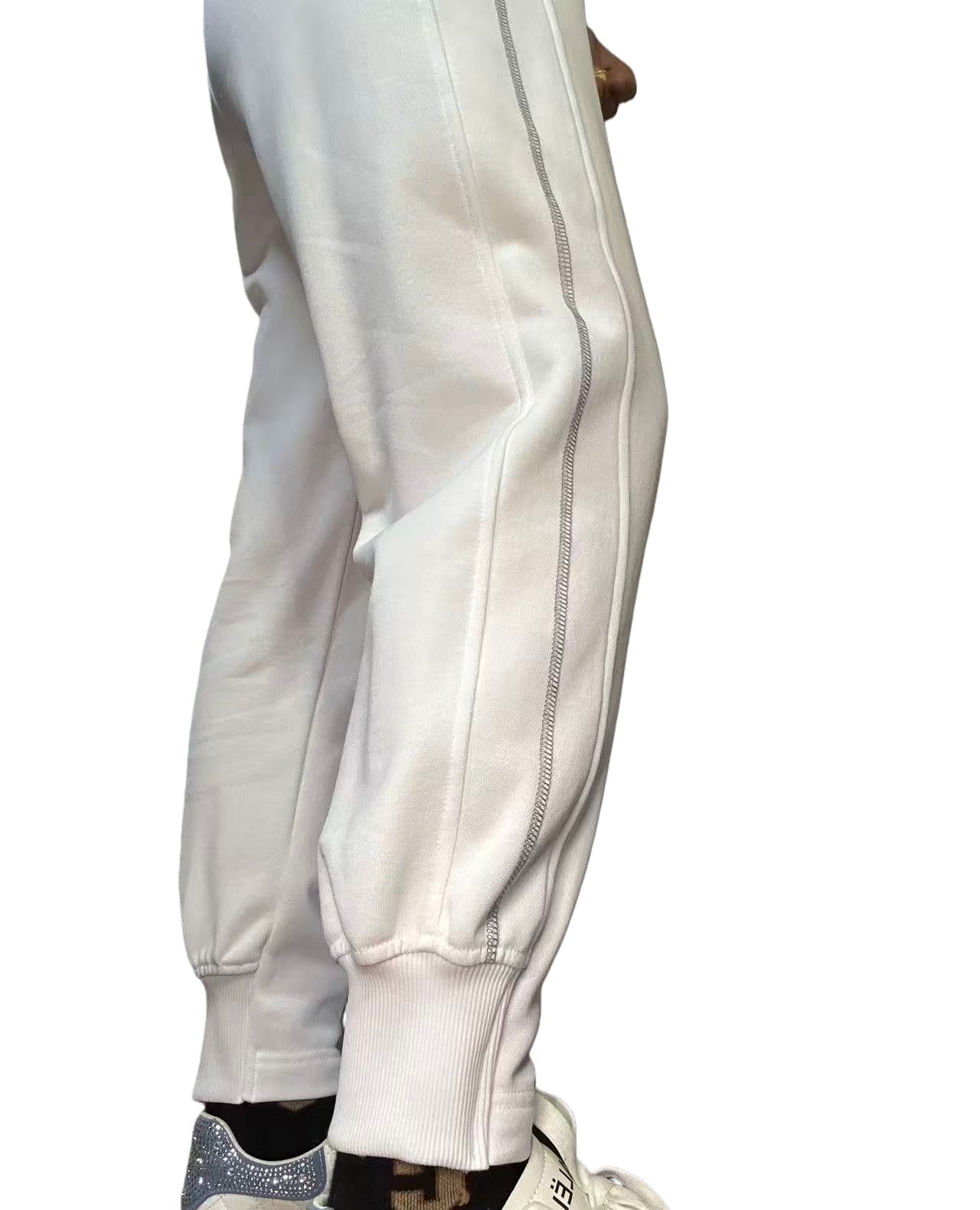 PANTALON AVEC MANCHETTES ET LÉVÈES LATÉRALES CONTRASTANTES